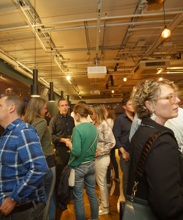 Guests watching the presentation