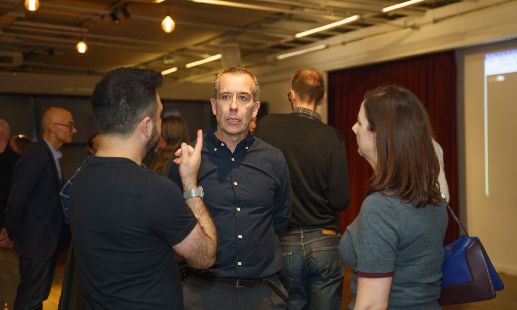 Guests in conversation after the talks